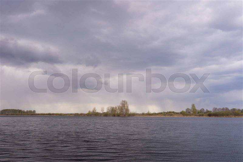 Bad weather over lake, stock photo