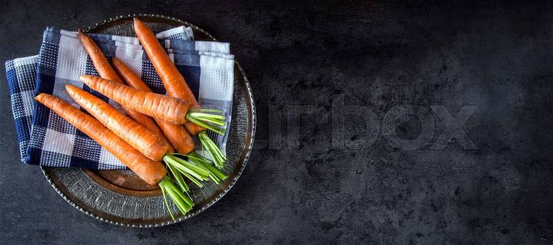 Carrot. Fresh Carrots bunch. Baby carrots. Raw fresh organic orange carrots. Healthy vegan vegetable food, stock photo