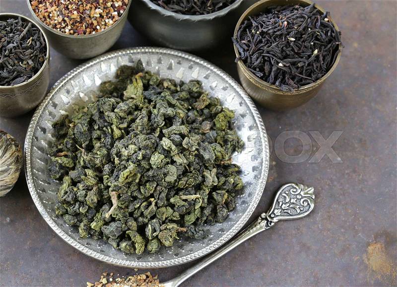 Different varieties of dry tea (black, white, green), stock photo