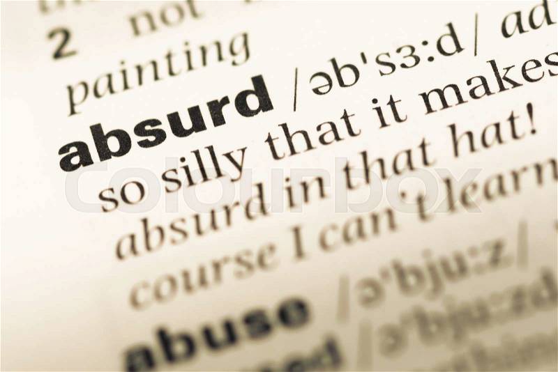 Close up of old English dictionary page with word absurd, stock photo