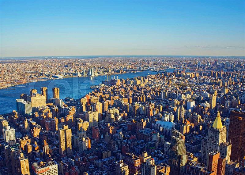 Aerial view from Observatory deck of the Empire State Building on Manhattan and Brooklyn, New York City, USA. Skyline with skyscrapers. Williamsburg, East River, stock photo