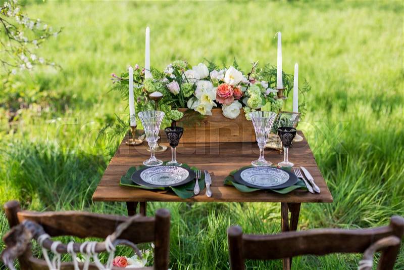 Wedding decor. Table for the newlyweds outdoor. Wedding reception, stock photo