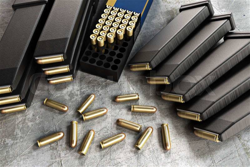 Assault rifle ammunition and loaded clips, stock photo