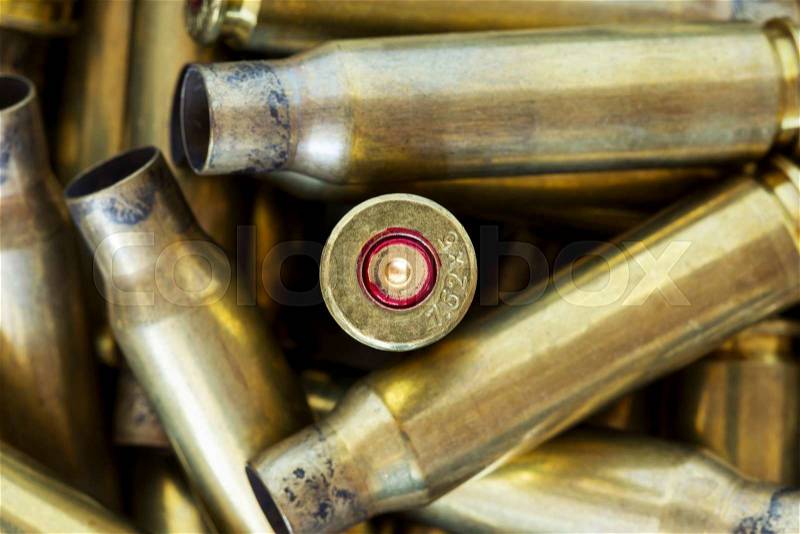 A handful of the used shell casings, stock photo
