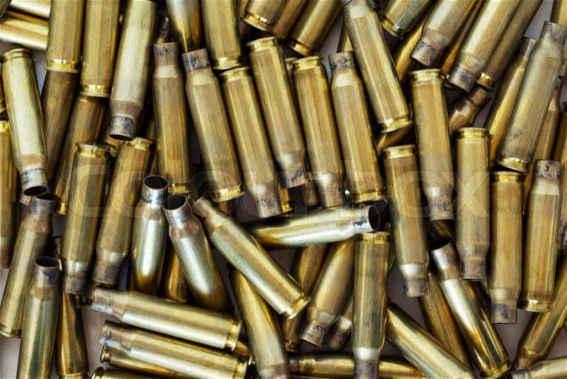 A handful of the used shell casings, stock photo
