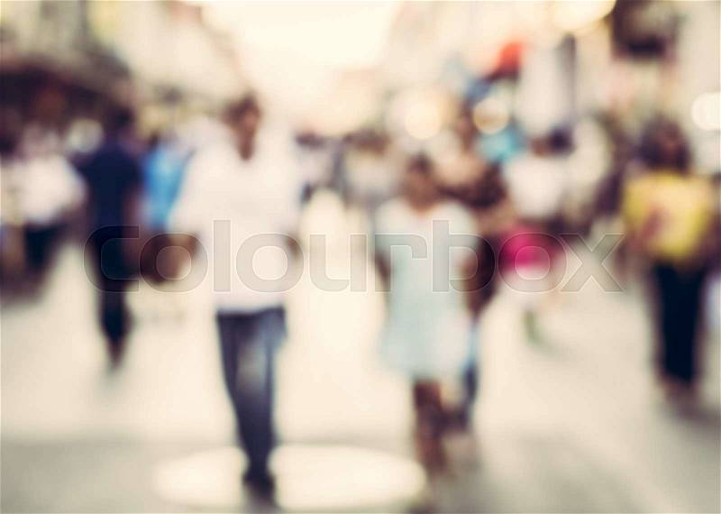 Abstract of blurred people walking on the street of old town for background, stock photo