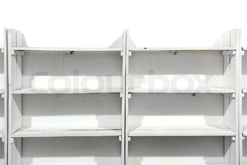 White wooden empty shelves on the store wall, stock photo