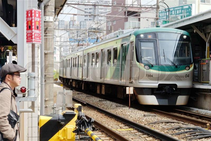 TOKYO - APRIL1, 2016 : Japanese Train, A commuter train heading towards Tokyo in April 1, 2016 Tokyo, Japan, stock photo