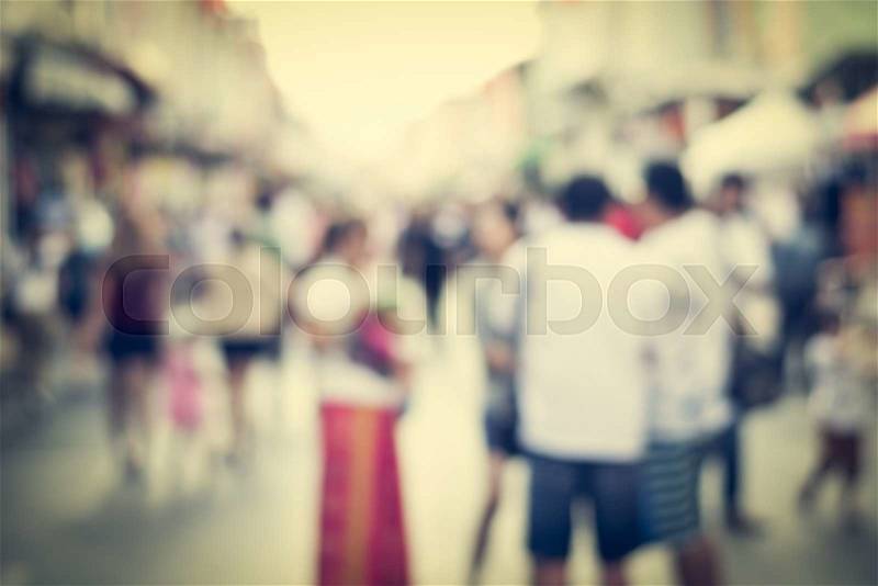 Blurred people walking on the street of phuket old town for background, stock photo