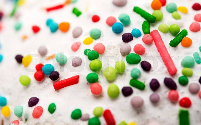 Multi-colored White Cake Pastry Sprinkles Texture Background closeup, stock photo