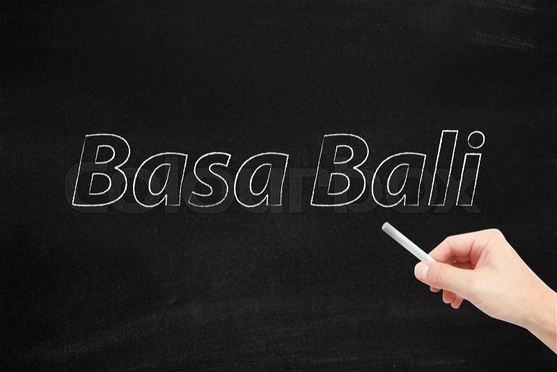 The language of Basa Bali written on a blackboard, stock photo