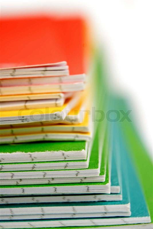 Color notebooks stack background, stock photo
