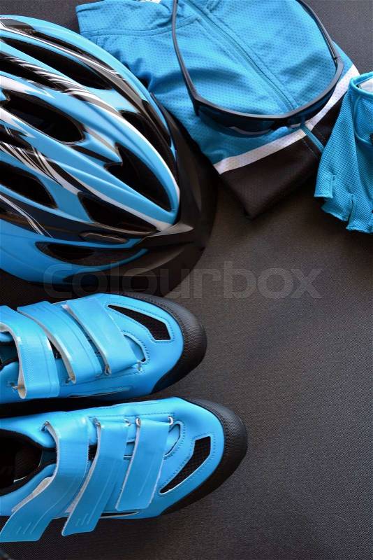 ACCESSORIES FOR MOUNTAIN BIKE, FORMED BY HELMET, JERSEY, GLOVES ETC, stock photo