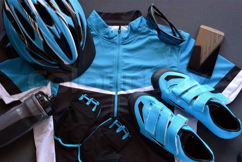 ACCESSORIES FOR MOUNTAIN BIKE, FORMED BY HELMET, JERSEY, GLOVES ETC, stock photo