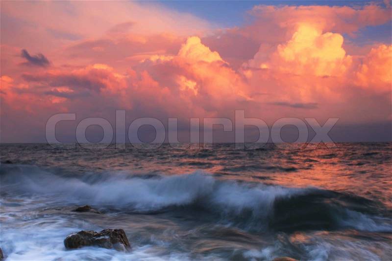 Stormy sunset on a tropical sea, stock photo