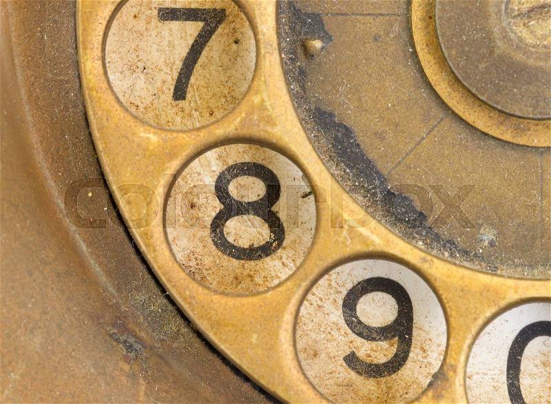 Close up of Vintage phone dial, dirty and scratched - 8, stock photo