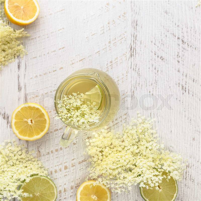 Elderflower syrup. Homemade elder flower syrup with a slice of lemon. Top view with copyspace, stock photo