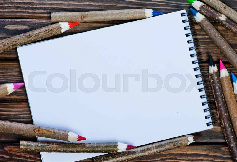 Color pencils on the wooden table, pencils on a table, stock photo