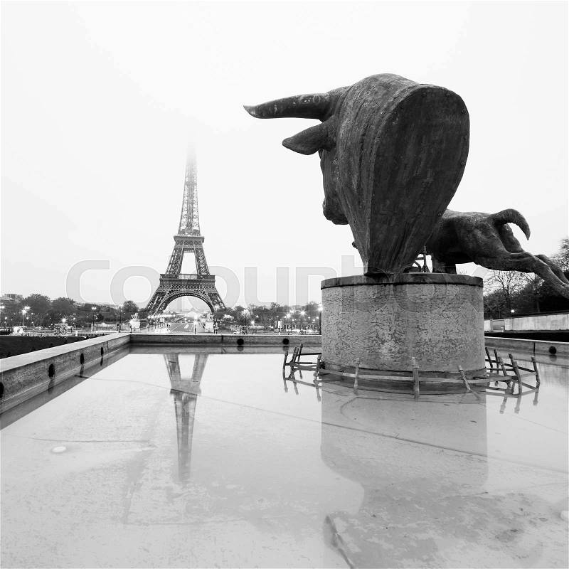 Sculptures and fountains on Trocadero and Eiffel Tower in Paris, France. Black and white vintage image. Square composition, stock photo
