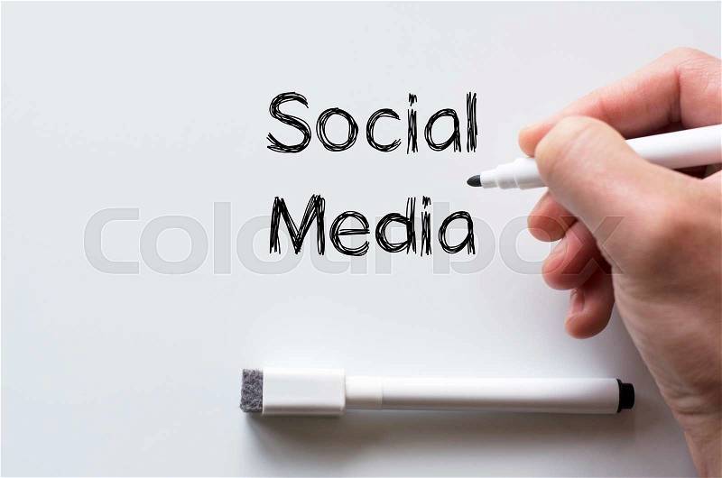 Human hand writing social media on whiteboard, stock photo