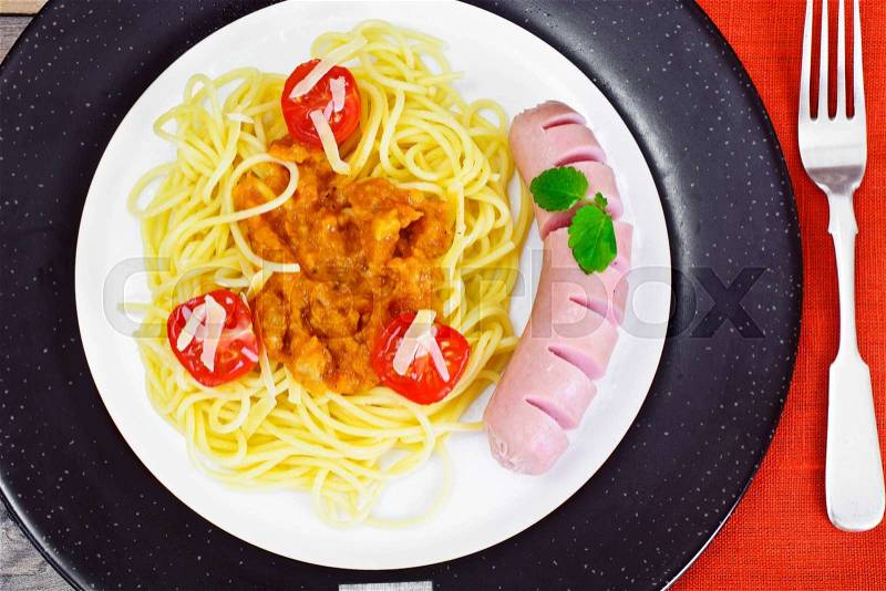 Pasta with Sausage and Squash Caviar on Plate. Studio Photo, stock photo