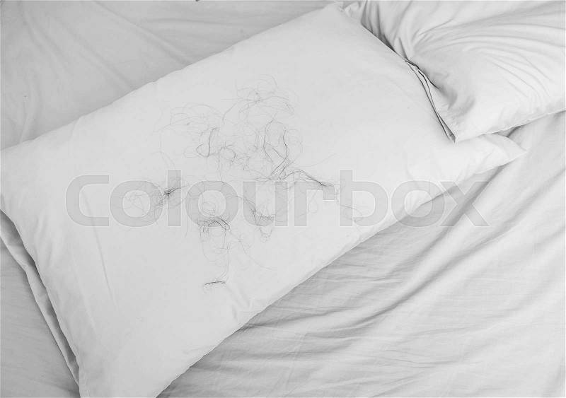 Hair loss with Pillow on the bed, background, stock photo
