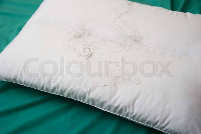 Hair loss with Pillow on the bed, background, stock photo