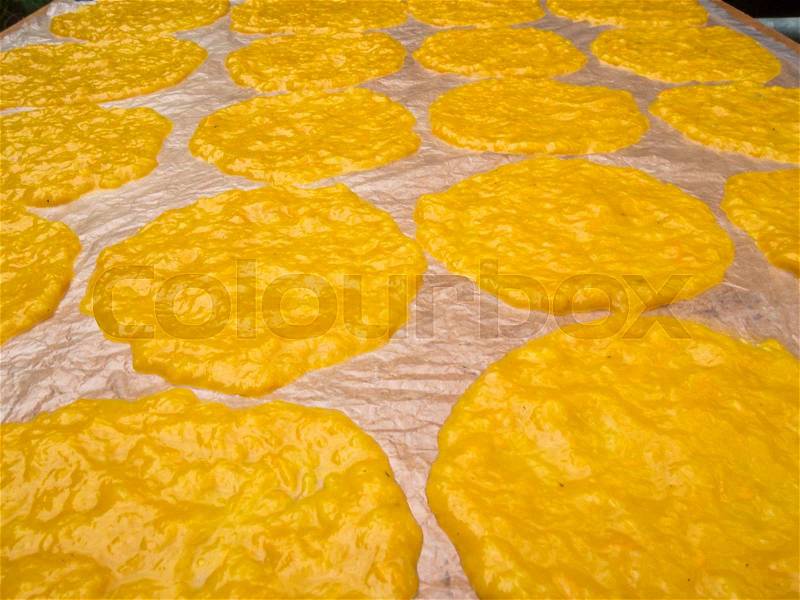 Mango sheet (dried mango paste) on plastic for sunburn, stock photo