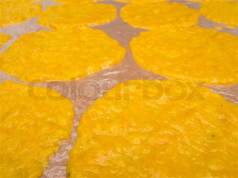 Mango sheet (dried mango paste) on plastic for sunburn, stock photo