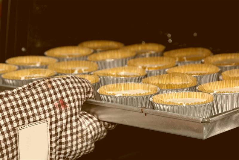 Baking homemade ,Cup cakes baking in oven, stock photo