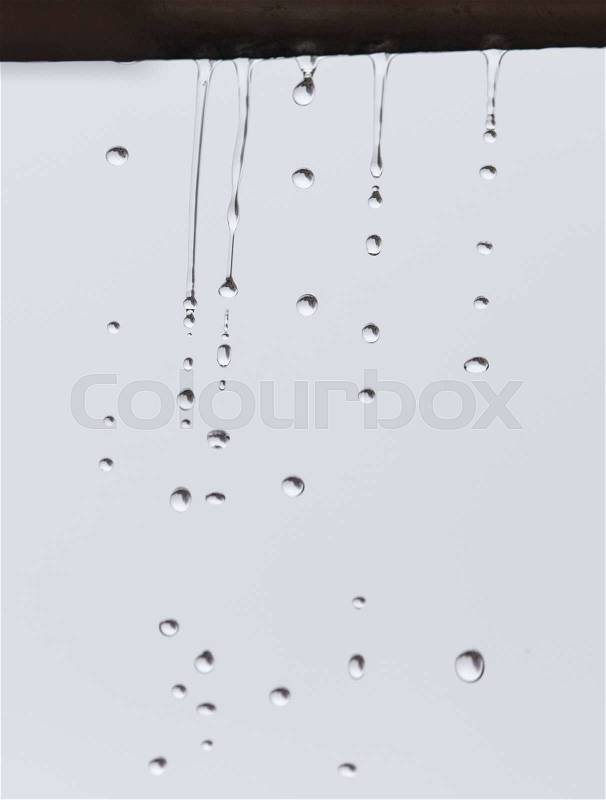 Drops from the roof of the rain, stock photo