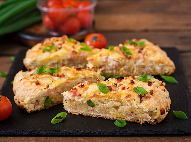 Soda scones (bread) with ham, cheese and chives. English cuisine, stock photo