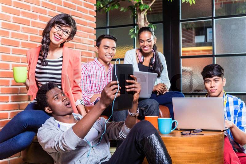 Group of diversity college students learning on campus, Indian, black, and Indonesian people, stock photo