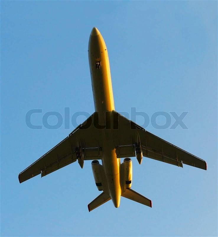 Takes off aero palne on sundown, stock photo