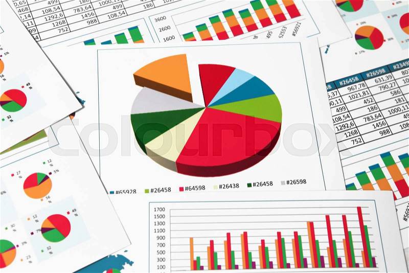 Financial paper charts and graphs in report, stock photo