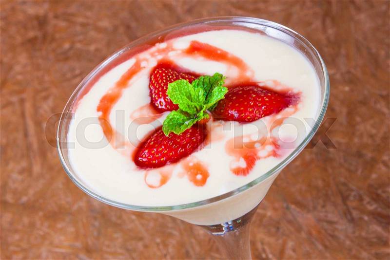 Dessert of Strawberry with Milk Cream and menta, stock photo