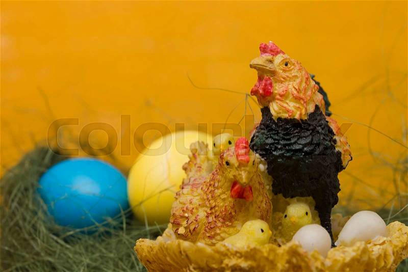 Easter Chicken Family on a wooden background, stock photo