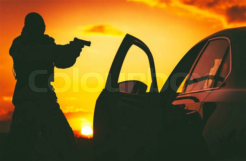 Counter Terrorism Check Point. Hunt For Terrorists. SWAT member in a Mask Pointing His Gun on Terrorist Member Inside Stopped Vehicle. , stock photo