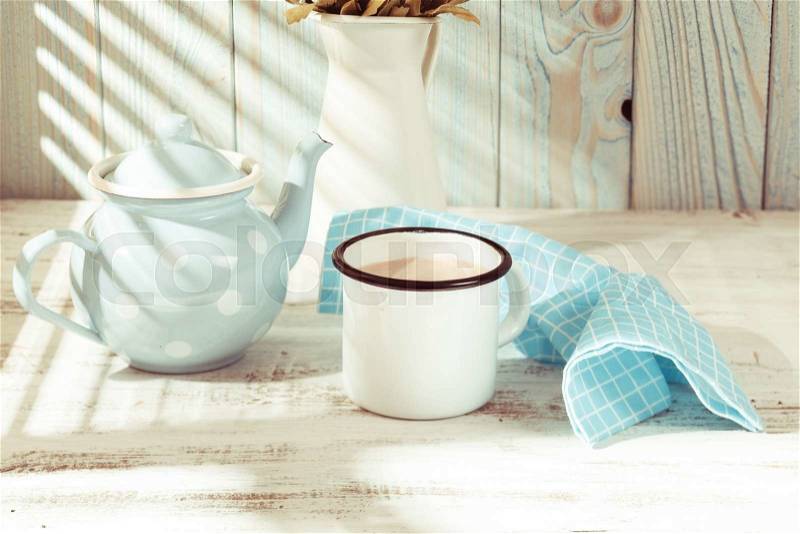 Morning cocoa cup on the kitchen table in shabby chic style, stock photo