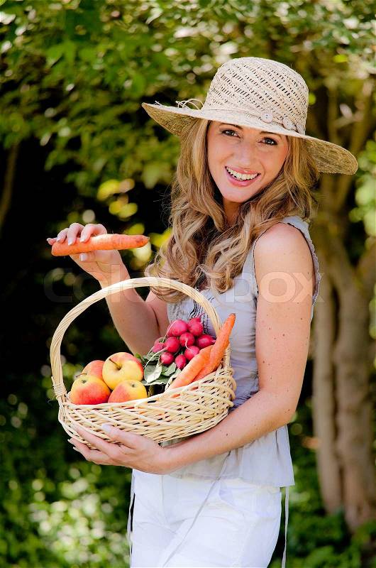 Fruit and vegetables in the basket with his wife, stock photo