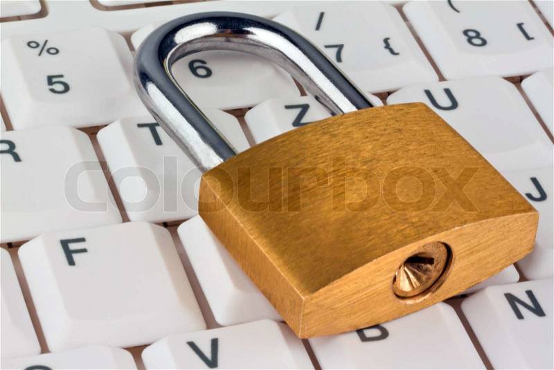 A padlock on a computer keyboard. Data security and protection, stock photo