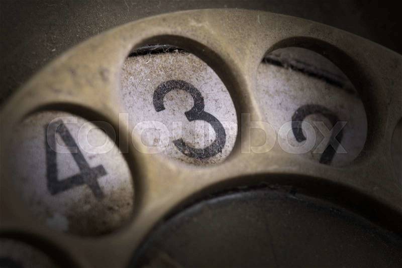 Close up of Vintage phone dial, dirty and scratched - 3, perspective, stock photo