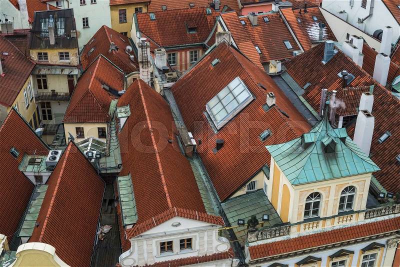 Red tile roofs of Prague, Czech Republic, in the old city center, view from above, stock photo