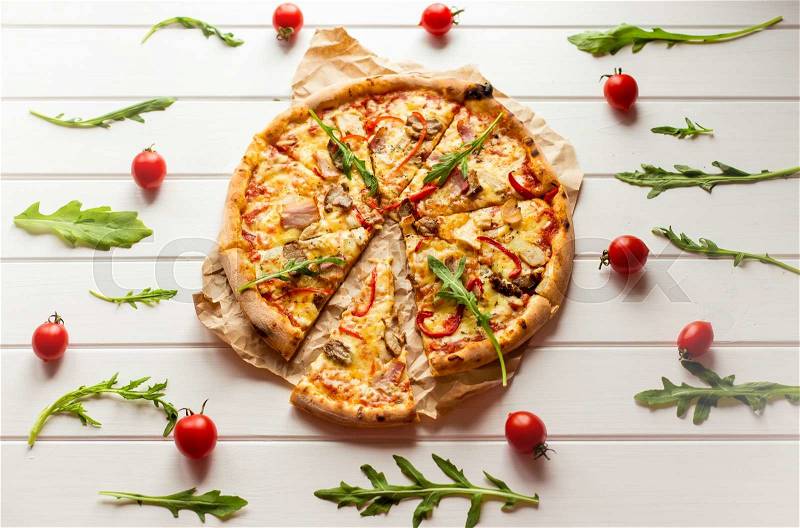Delicious italian pizza served on wooden table. Top view, stock photo