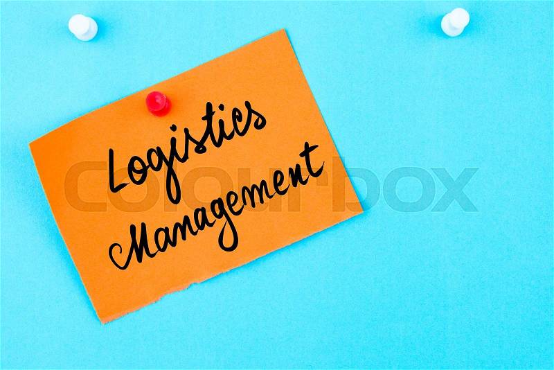 Logistics Management written on orange paper note pinned on cork board with white thumbtack, copy space available, stock photo