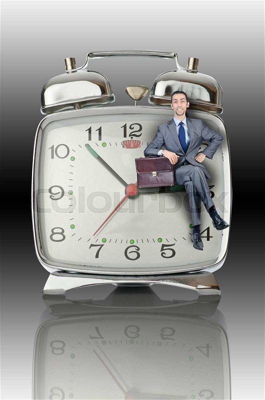 Business concept with businessman and clock, stock photo