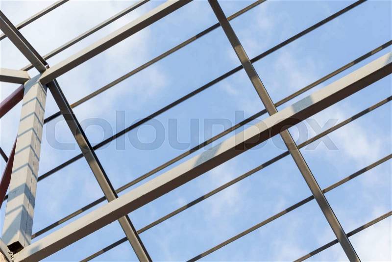 Steel beams roof truss residential building construction industry, stock photo