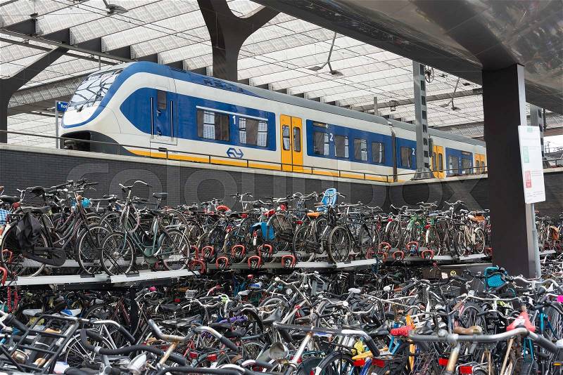 ROTTERDAM,HOLLAND-MAY 18, new bicycle storage for thousand of bikes at the backsite of the new build rotterdam central station on May 18 2016 in Rotterrdam, this station is opened in end 2015, stock photo