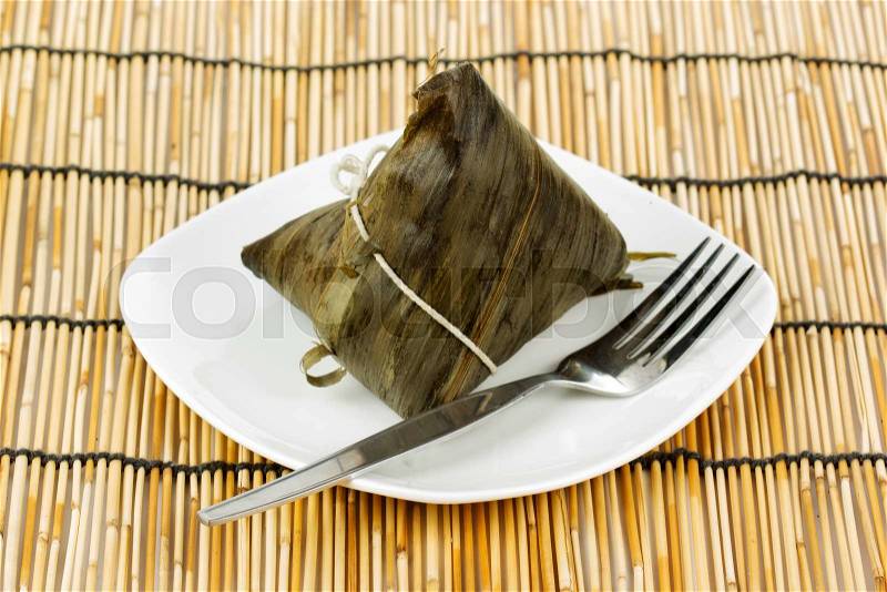 Zongzi or sticky rice dumpling on the plate, stock photo