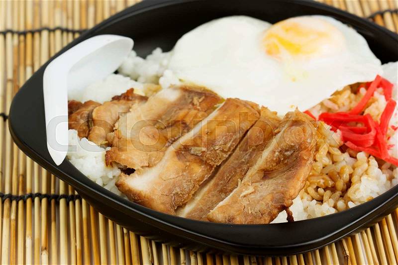 Grill Pork on rice in plastic package, stock photo